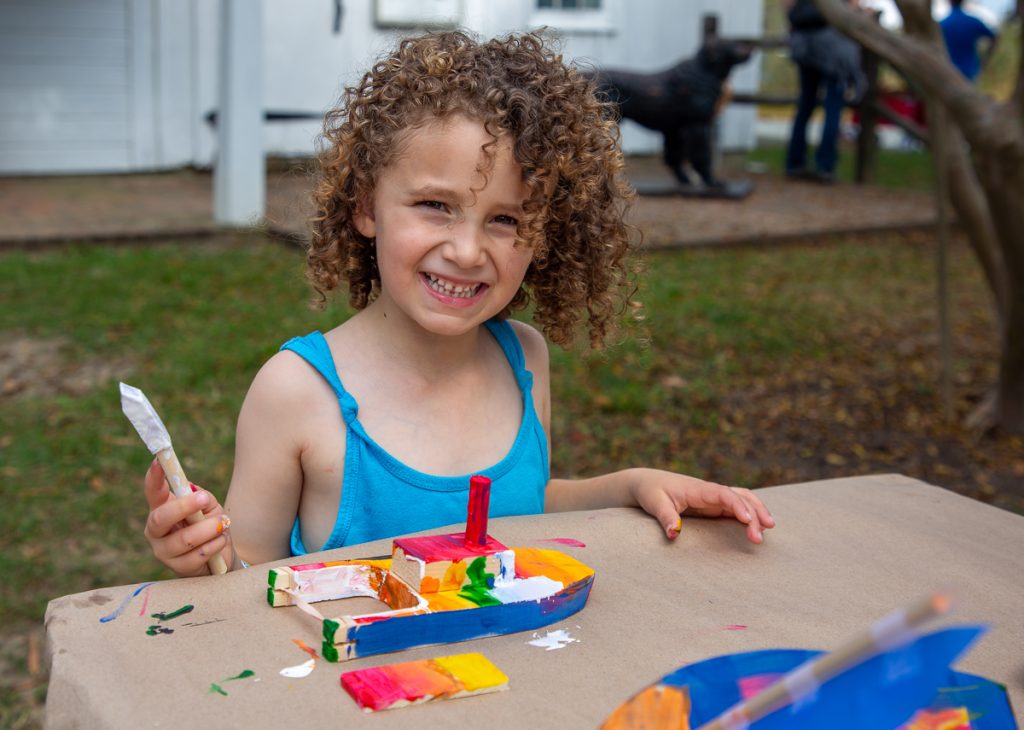 OysterFest shares fun for all ages, including model boat building and more for children. (Photo by Sharon Thorpe)