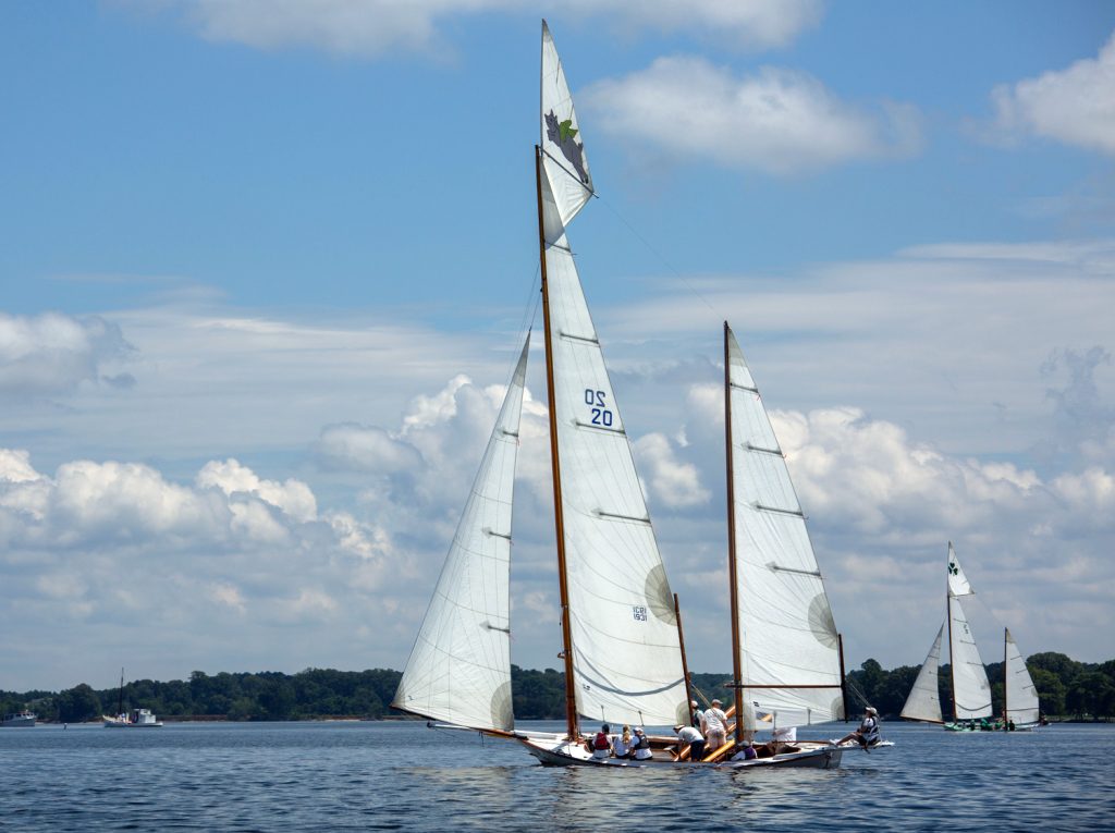 On select weekends this summer, CBMM is offering private charters aboard its historic floating fleet vessels to watch log canoe races on the Miles River.