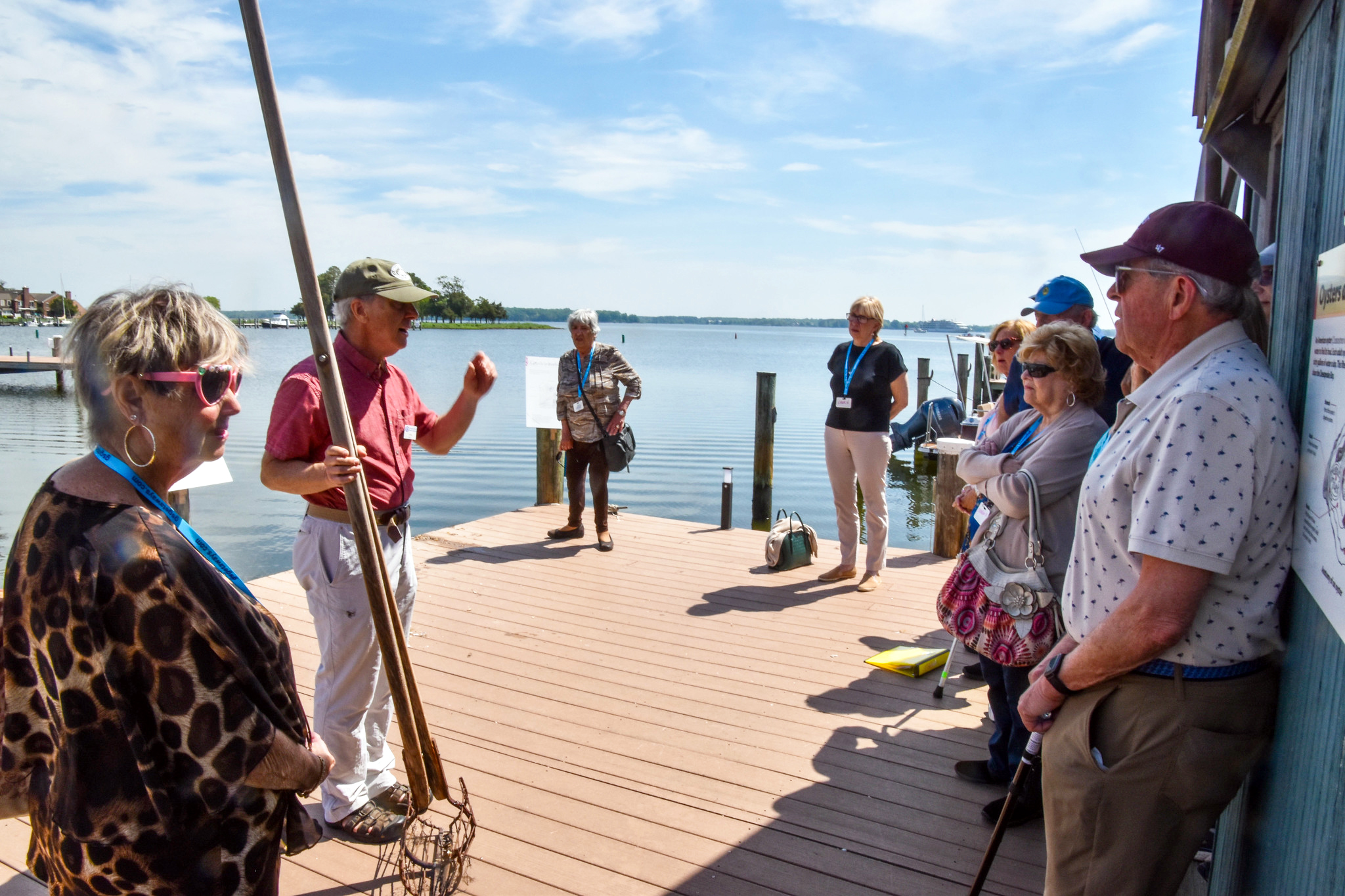 A CBMM interpreter shares a story with guests at Waterman's Wharf.