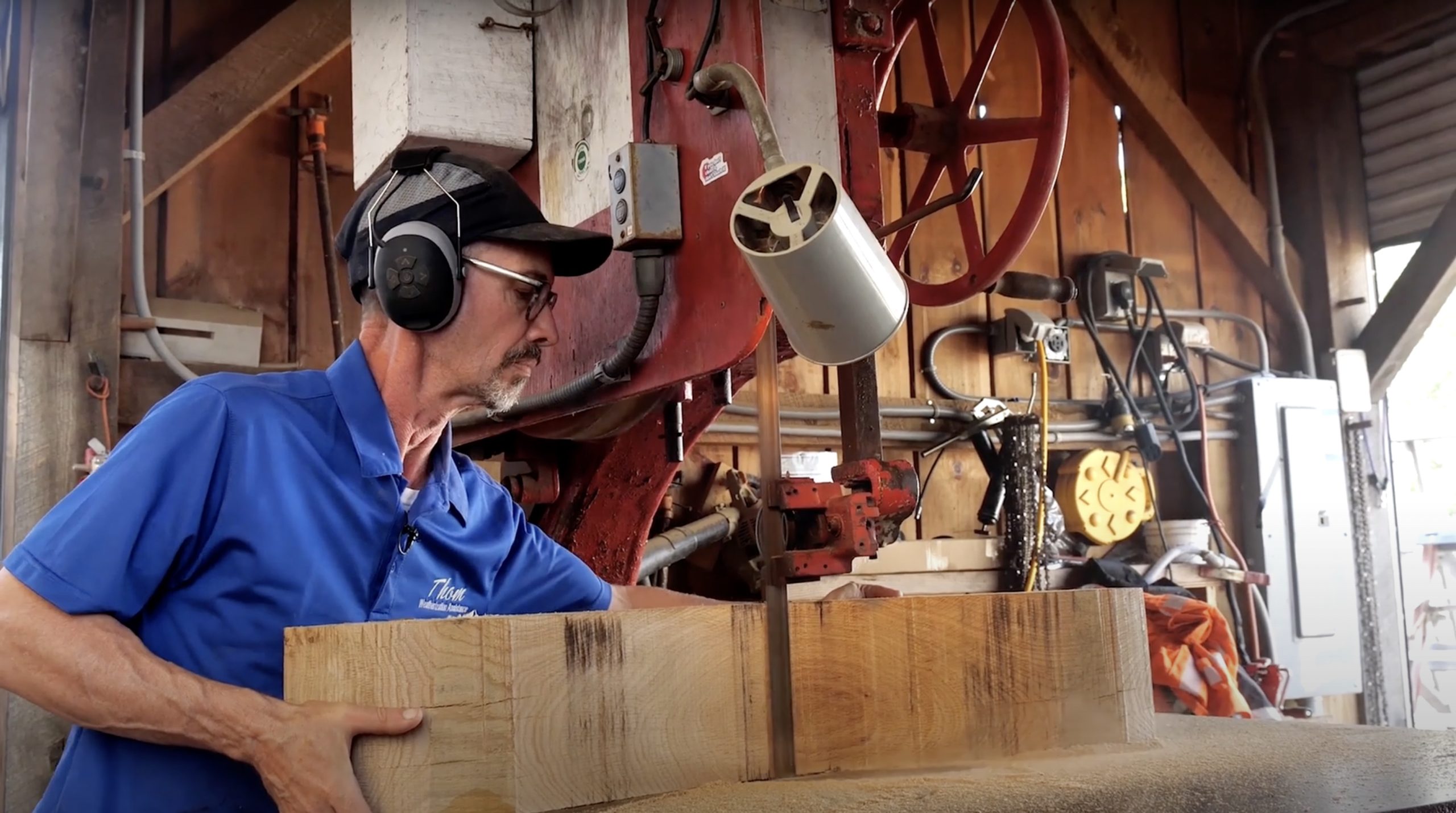 Thom Price works on the ship saw in CBMM's Shipyard.